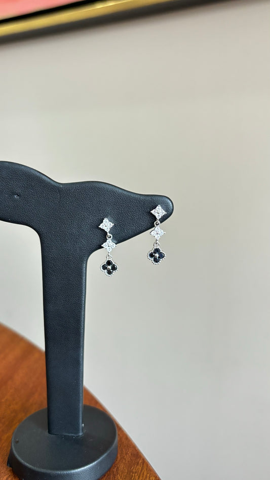 Aretes flores black